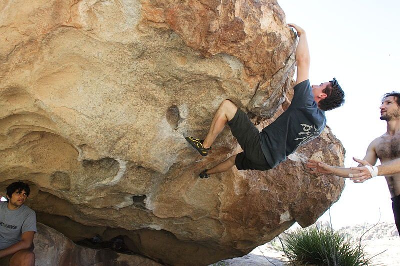 Raanan Robertson rock climbing on No One Gets Out of Here Alive (V2) in Hueco Tanks State Park and Historic Site during the Hueco Tanks Awesome Fest 2010 trip, Sunday, May 23, 2010.

Filename: SRM_20100523_10565998.JPG
Aperture: f/5.6
Shutter Speed: 1/640
Body: Canon EOS-1D Mark II
Lens: Canon EF 16-35mm f/2.8 L