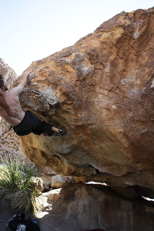 Andrew Dreher rock climbing on No One Gets Out of Here Alive (V2) in Hueco Tanks State Park and Historic Site during the Hueco Tanks Awesome Fest 2010 trip, Sunday, May 23, 2010.

Filename: SRM_20100523_11224890.JPG
Aperture: f/5.6
Shutter Speed: 1/500
Body: Canon EOS-1D Mark II
Lens: Canon EF 16-35mm f/2.8 L