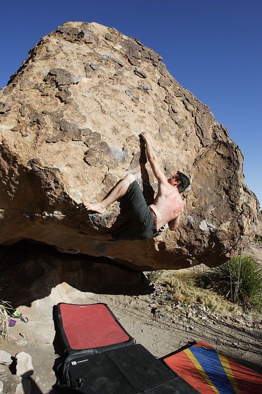 Raanan Robertson rock climbing barefoot on No One Gets Out of Here Alive (V2) in Hueco Tanks State Park and Historic Site during the Hueco Tanks Awesome Fest 2010 trip, Sunday, May 23, 2010.

Filename: SRM_20100523_18405487.JPG
Aperture: f/8.0
Shutter Speed: 1/1000
Body: Canon EOS-1D Mark II
Lens: Canon EF 16-35mm f/2.8 L