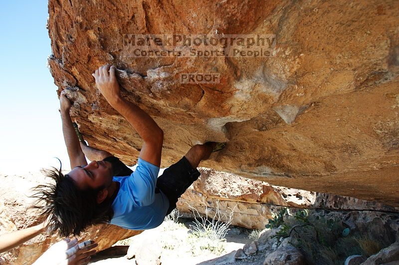 Javier Morales rock climbing on Mexican Chicken (V6) in Hueco Tanks State Park and Historic Site during the Hueco Tanks Awesome Fest 2010 trip, Monday, May 24, 2010.

Filename: SRM_20100524_11553398.JPG
Aperture: f/4.0
Shutter Speed: 1/1000
Body: Canon EOS-1D Mark II
Lens: Canon EF 16-35mm f/2.8 L