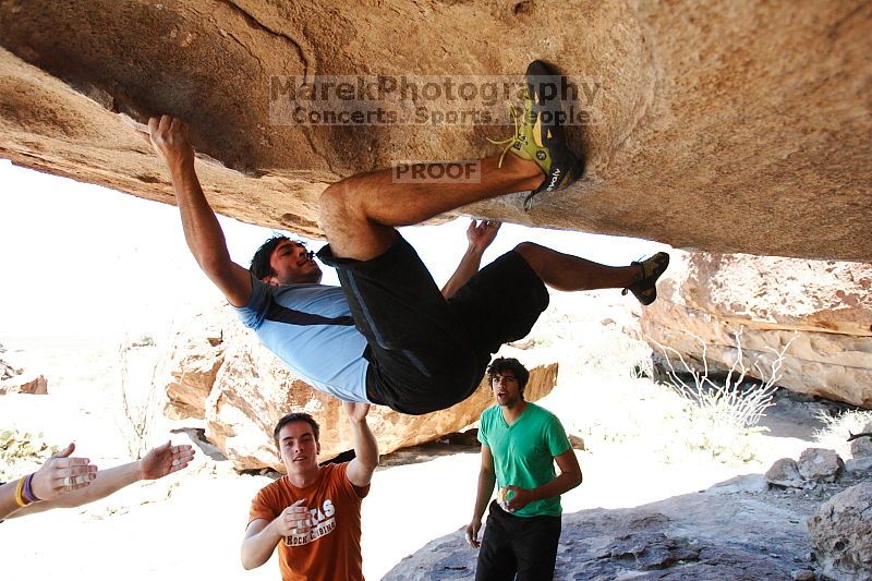 Javier Morales rock climbing on Mexican Chicken (V6) in Hueco Tanks State Park and Historic Site during the Hueco Tanks Awesome Fest 2010 trip, Monday, May 24, 2010.

Filename: SRM_20100524_12145318.JPG
Aperture: f/4.0
Shutter Speed: 1/2500
Body: Canon EOS-1D Mark II
Lens: Canon EF 16-35mm f/2.8 L