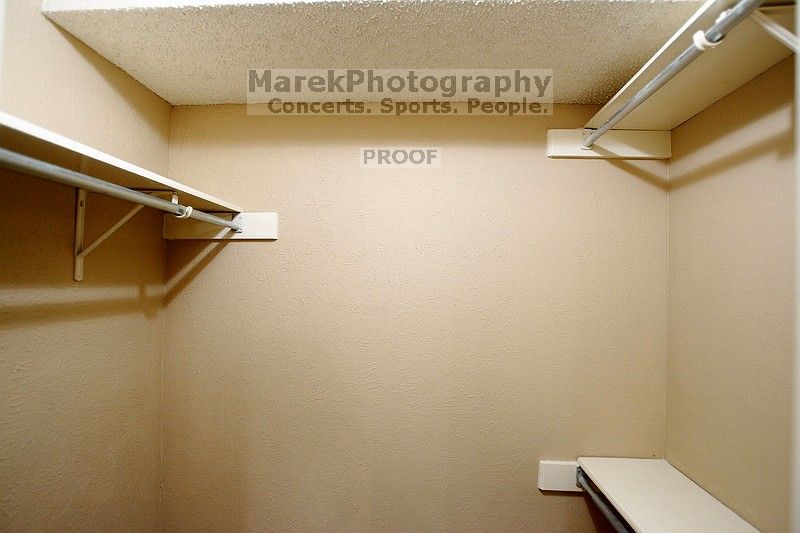 View of downstairs bedroom walk-in closet.

Filename: SRM_20101228_18011573.JPG
Aperture: f/2.8
Shutter Speed: 1/40
Body: Canon EOS-1D Mark II
Lens: Canon EF 16-35mm f/2.8 L