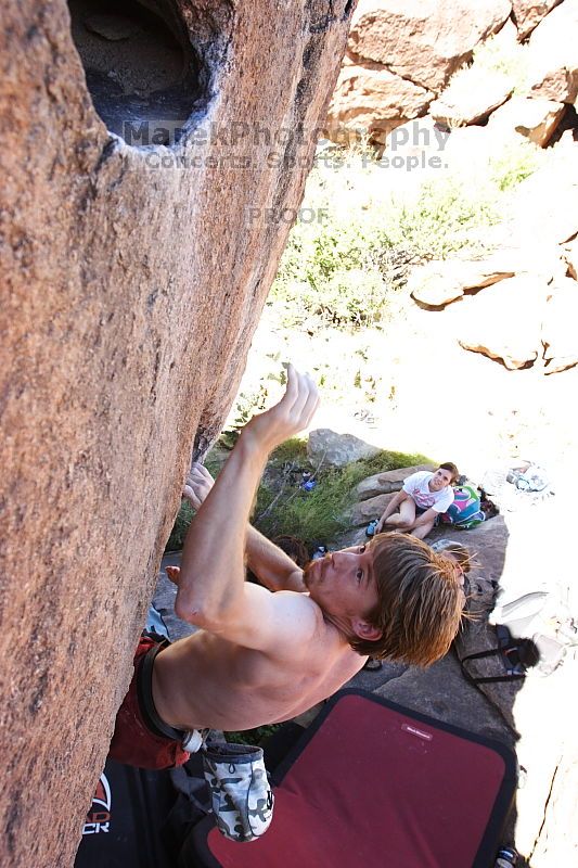 Rock climbing in Hueco Tanks State Park and Historic Site during the Hueco Tanks Awesome Fest 2.0 trip, Sunday, September 05, 2010.

Filename: SRM_20100905_12064753.JPG
Aperture: f/5.6
Shutter Speed: 1/500
Body: Canon EOS 20D
Lens: Canon EF 16-35mm f/2.8 L