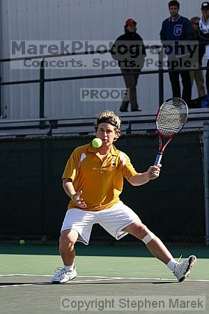 Jose Muguruza goes for the ball in a doubles match against Georgia State.  Stiegwardt/Twarowski of GSU defeated Scott Blackmon and Jose Muguruza of Tech by 8-3 after a "let" disagreement.                                                                    

Filename: img_7840_std.jpg
Aperture: f/4.5
Shutter Speed: 1/1600
Body: Canon EOS DIGITAL REBEL
Lens: Canon EF 80-200mm f/2.8 L