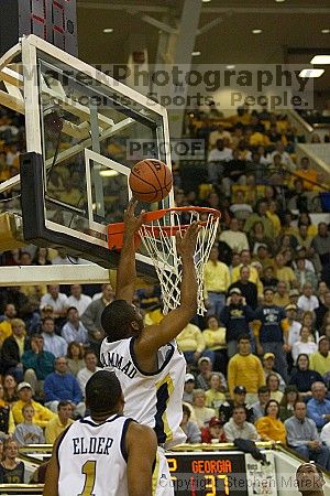 Isma'il Muhammad takes a shot.  Men's Basketball Georgia Tech beat UGA 87-49.

Filename: crw_6027_std.jpg
Aperture: f/2.8
Shutter Speed: 1/640
Body: Canon EOS DIGITAL REBEL
Lens: Canon EF 80-200mm f/2.8 L