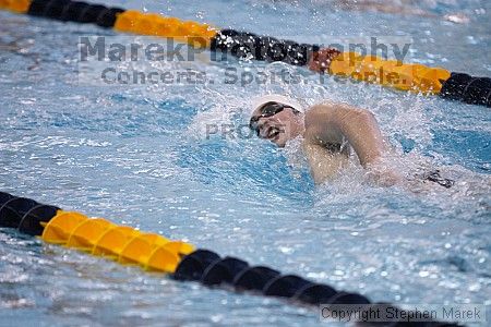 Jeff Burton competed in the 1000m freestyle against FSU, UMD and VT

Filename: crw_2924_std.jpg
Aperture: f/2.8
Shutter Speed: 1/500
Body: Canon EOS DIGITAL REBEL
Lens: Canon EF 80-200mm f/2.8 L