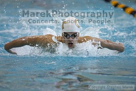 Onur Uras of GT competes in the butterfly against the University of Tennessee.

Filename: crw_2206_std.jpg
Aperture: f/2.8
Shutter Speed: 1/640
Body: Canon EOS DIGITAL REBEL
Lens: Canon EF 80-200mm f/2.8 L