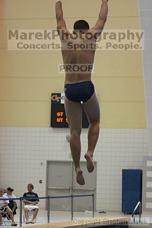 Diver Pete Doblar competes against the University of Tennessee.

Filename: crw_2159_std.jpg
Aperture: f/2.8
Shutter Speed: 1/500
Body: Canon EOS DIGITAL REBEL
Lens: Canon EF 80-200mm f/2.8 L