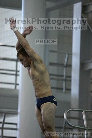 Diver Pete Doblar competes against the University of Tennessee.

Filename: crw_2247_std.jpg
Aperture: f/2.8
Shutter Speed: 1/640
Body: Canon EOS DIGITAL REBEL
Lens: Canon EF 80-200mm f/2.8 L