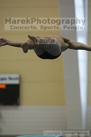 Diver Pete Doblar competes against the University of Tennessee.

Filename: crw_2174_std.jpg
Aperture: f/2.8
Shutter Speed: 1/1000
Body: Canon EOS DIGITAL REBEL
Lens: Canon EF 80-200mm f/2.8 L