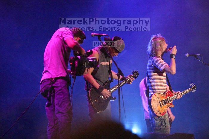 Puddle of Mudd performs on the 99X stage on the first day of Music Midtown, 2004.

Filename: IMG_6115.jpg
Aperture: f/2.8
Shutter Speed: 1/200
Body: Canon EOS DIGITAL REBEL
Lens: Canon EF 80-200mm f/2.8 L