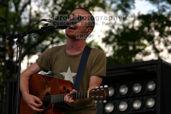 Damien Rice performs on the 99X stage on the second day of Music Midtown, 2004.

Filename: IMG_6319.jpg
Aperture: f/5.6
Shutter Speed: 1/320
Body: Canon EOS DIGITAL REBEL
Lens: Canon EF 80-200mm f/2.8 L