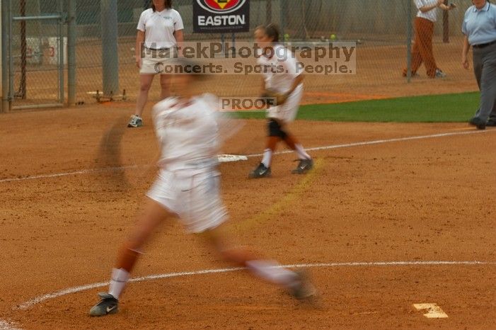 Cat Osterman pitching to the Mean Green. The Lady Longhorns beat the University of North Texas 5-0 in the first game of the double header Wednesday night.
Filename: SRM_20060308_210011_0.jpg
Aperture: f/6.3
Shutter Speed: 1/20
Body: Canon EOS 20D
Lens: Canon EF 80-200mm f/2.8 L