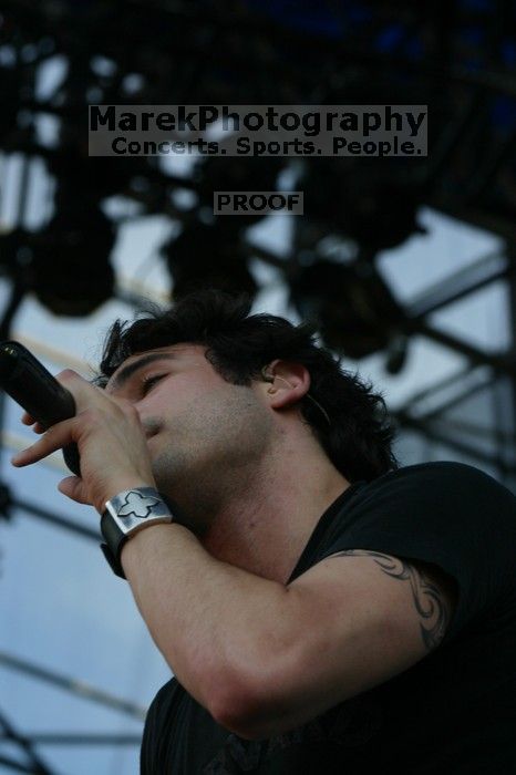 Trapt performs on the 99X stage on the second day of Music Midtown, 2004.

Filename: IMG_6548.jpg
Aperture: f/8.0
Shutter Speed: 1/320
Body: Canon EOS DIGITAL REBEL
Lens: Canon EF 80-200mm f/2.8 L