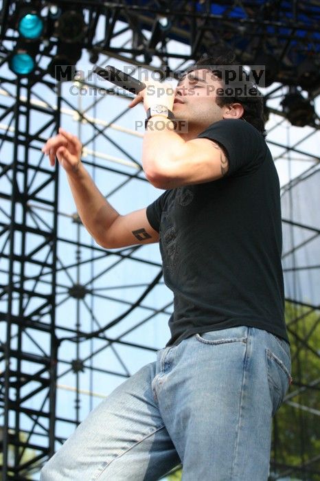 Trapt performs on the 99X stage on the second day of Music Midtown, 2004.

Filename: IMG_6518.jpg
Aperture: f/5.0
Shutter Speed: 1/320
Body: Canon EOS DIGITAL REBEL
Lens: Canon EF 80-200mm f/2.8 L