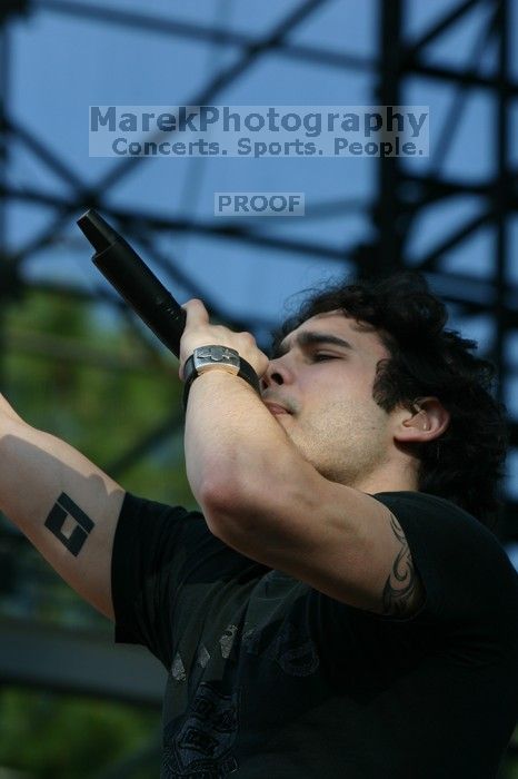 Trapt performs on the 99X stage on the second day of Music Midtown, 2004.

Filename: IMG_6455.jpg
Aperture: f/6.3
Shutter Speed: 1/320
Body: Canon EOS DIGITAL REBEL
Lens: Canon EF 80-200mm f/2.8 L