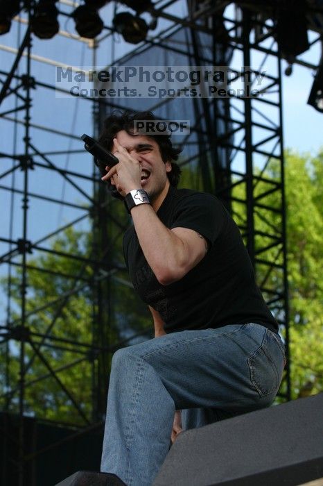 Trapt performs on the 99X stage on the second day of Music Midtown, 2004.

Filename: IMG_6449.jpg
Aperture: f/5.6
Shutter Speed: 1/320
Body: Canon EOS DIGITAL REBEL
Lens: Canon EF 80-200mm f/2.8 L