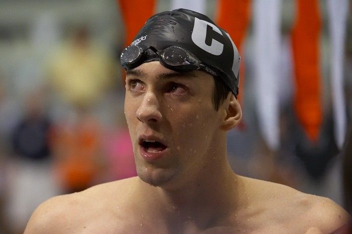 Michael Phelps of the University of Michigan Swim Team placed 1st in the last heat of the 200 IM Finals with a record time of 1:41.30, beating the old record of 1:41.71 at the Speedo American Short Course Championships.

Filename: SRM_20060304_192530_0.jpg
Aperture: f/4.0
Shutter Speed: 1/320
Body: Canon EOS 20D
Lens: Canon EF 80-200mm f/2.8 L