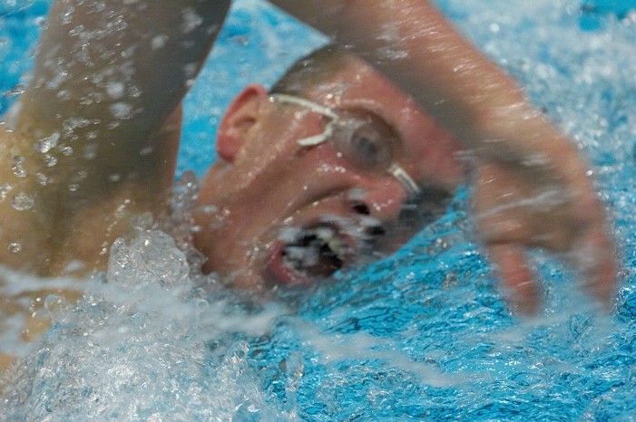 Blake Copple of the University of Texas Men's Varsity Swim Team placed 2nd in the 3rd heat of the 1650 Freestyle Prelims with a time of 15:57.48 at the Speedo American Short Course Championships.

Filename: SRM_20060304_114250_6.jpg
Aperture: f/4.0
Shutter Speed: 1/400
Body: Canon EOS 20D
Lens: Canon EF 80-200mm f/2.8 L