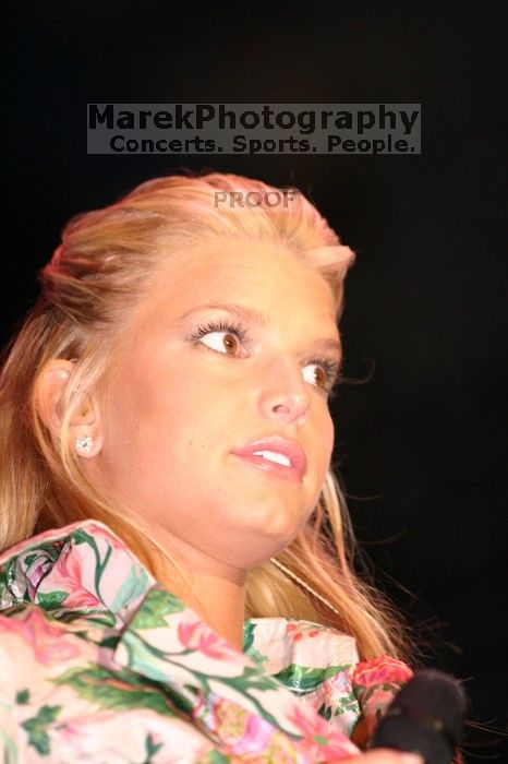 Jessica Simpson performs on the third day of Music Midtown, 2004.

Filename: IMG_7366.jpg
Aperture: f/2.8
Shutter Speed: 1/250
Body: Canon EOS DIGITAL REBEL
Lens: Canon EF 80-200mm f/2.8 L