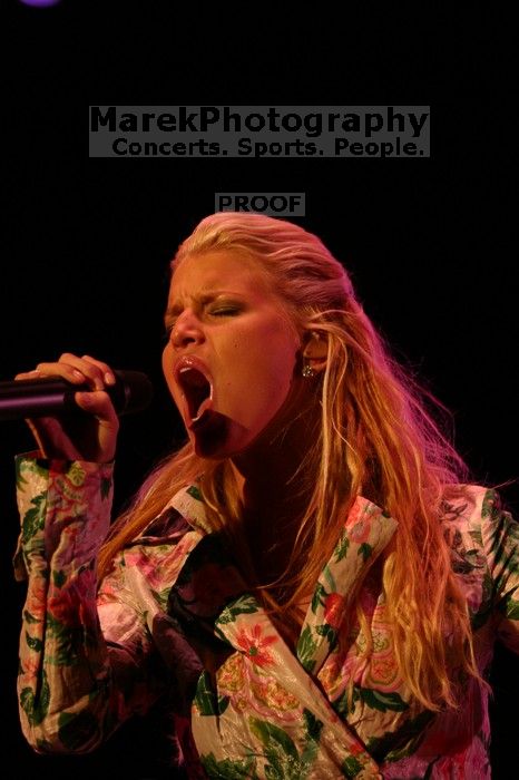 Jessica Simpson performs on the third day of Music Midtown, 2004.

Filename: IMG_7332.jpg
Aperture: f/2.8
Shutter Speed: 1/250
Body: Canon EOS DIGITAL REBEL
Lens: Canon EF 80-200mm f/2.8 L