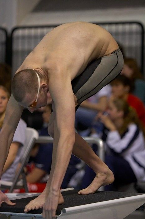 Scott Drews of the University of Texas Men's Varsity Swim Team placed 5th in the 1st heat of the 1650 Freestyle with a time of 15:38.65 at the Speedo American Short Course Championships.

Filename: SRM_20060304_185050_1.jpg
Aperture: f/2.8
Shutter Speed: 1/1000
Body: Canon EOS 20D
Lens: Canon EF 80-200mm f/2.8 L