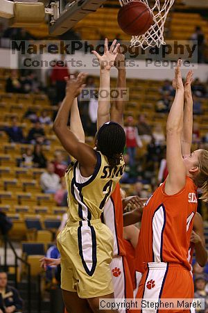 The Georgia Tech women's basketball team played Clemson.

Filename: img_0540_std.jpg
Aperture: f/2.8
Shutter Speed: 1/320
Body: Canon EOS DIGITAL REBEL
Lens: Canon EF 80-200mm f/2.8 L