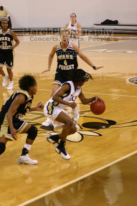 The Georgia Tech women's basketball team played Wake Forest.

Filename: IMG_1151.jpg
Aperture: f/2.8
Shutter Speed: 1/320
Body: Canon EOS DIGITAL REBEL
Lens: Canon EF 80-200mm f/2.8 L