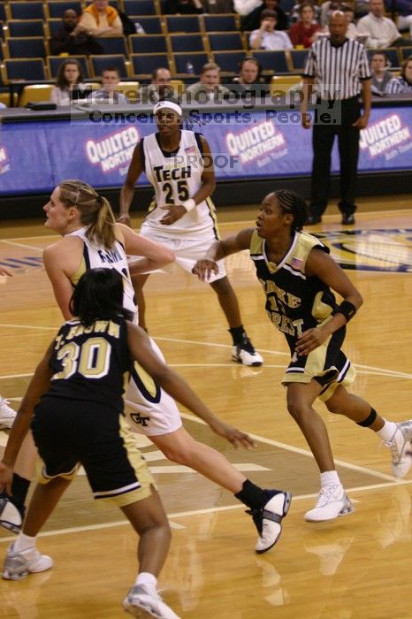 The Georgia Tech women's basketball team played Wake Forest.

Filename: IMG_1106.jpg
Aperture: f/2.8
Shutter Speed: 1/320
Body: Canon EOS DIGITAL REBEL
Lens: Canon EF 80-200mm f/2.8 L