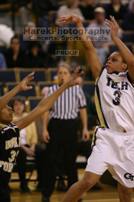 The Georgia Tech women's basketball team played Wake Forest.

Filename: IMG_1124.jpg
Aperture: f/2.8
Shutter Speed: 1/320
Body: Canon EOS DIGITAL REBEL
Lens: Canon EF 80-200mm f/2.8 L