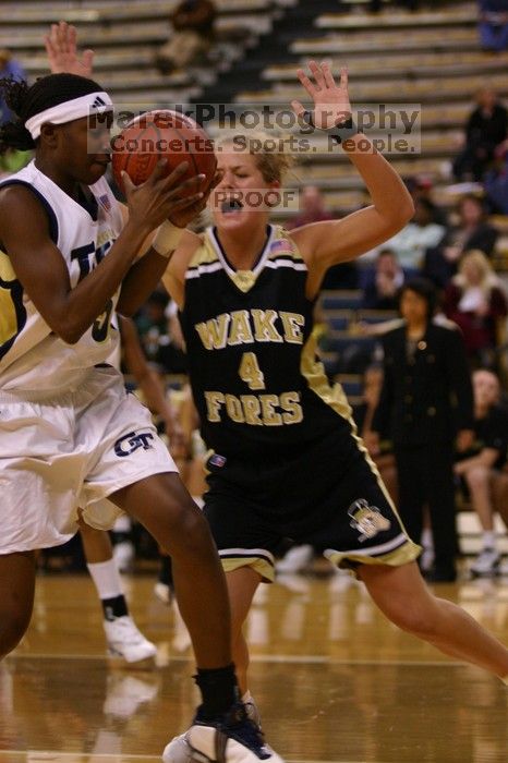 The Georgia Tech women's basketball team played Wake Forest.

Filename: IMG_1049.jpg
Aperture: f/2.8
Shutter Speed: 1/320
Body: Canon EOS DIGITAL REBEL
Lens: Canon EF 80-200mm f/2.8 L