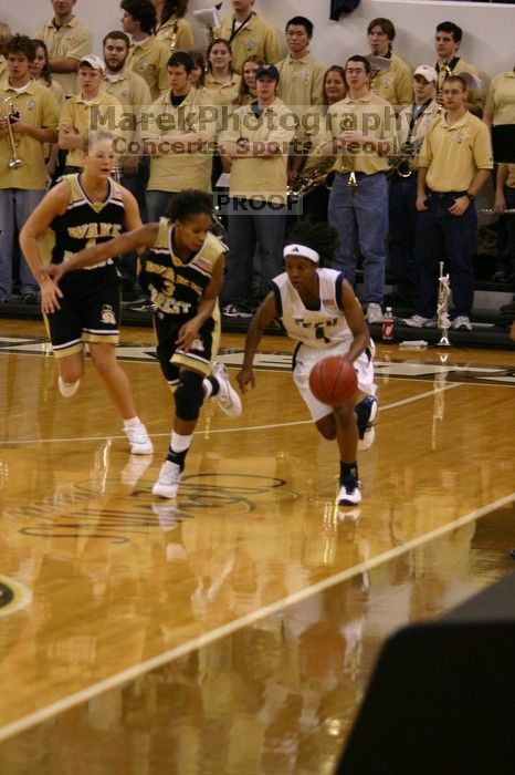 The Georgia Tech women's basketball team played Wake Forest.

Filename: IMG_1150.jpg
Aperture: f/2.8
Shutter Speed: 1/320
Body: Canon EOS DIGITAL REBEL
Lens: Canon EF 80-200mm f/2.8 L