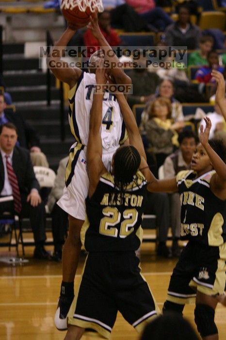 The Georgia Tech women's basketball team played Wake Forest.

Filename: IMG_1121.jpg
Aperture: f/2.8
Shutter Speed: 1/320
Body: Canon EOS DIGITAL REBEL
Lens: Canon EF 80-200mm f/2.8 L