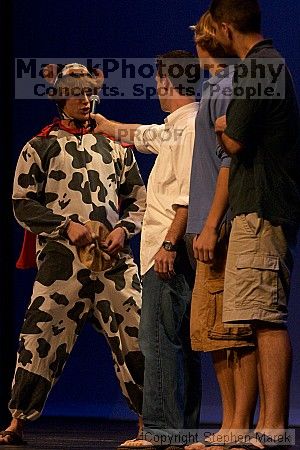 The superhero contest, which took place earlier in the day, was brought on stage in between acts at the Mock Rock competition at the Ferst Center.

Filename: crw_1632_std.jpg
Aperture: f/6.3
Shutter Speed: 1/60
Body: Canon EOS DIGITAL REBEL
Lens: Canon EF 80-200mm f/2.8 L